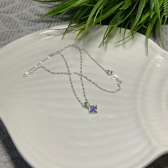 PUNTO DE LUZ ROMBO TORNASOL