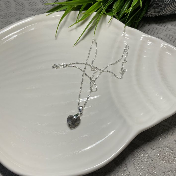 PUNTO DE LUZ CORAZON GRIS