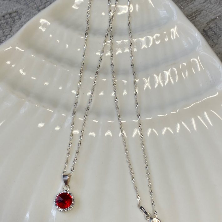 PUNTO DE LUZ REDONDO CON MICROCIRCONES ROJO