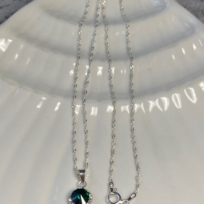 PUNTO DE LUZ REDONDO CON MICROCIRCONES VERDE